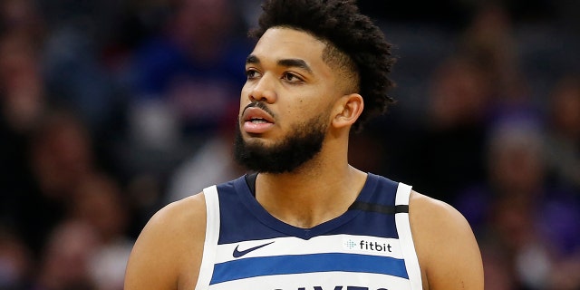 FILE - In this Feb. 3, 2020, file photo, Minnesota Timberwolves center Karl-Anthony Towns is shown during the second half of an NBA basketball game against the Sacramento Kings in Sacramento, Calif.