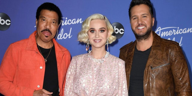 (L-R) Lionel Richie, Katy Perry and Luke Bryan attend the premiere event for "American Idol" hosted by ABC at Hollywood Roosevelt Hotel on February 12, 2020 in Hollywood, California.