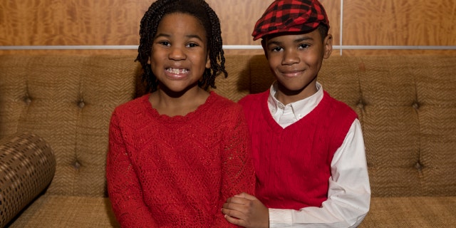 Cameron, 6, and Brandon, 7, pose together.