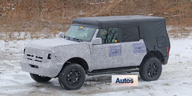 The wrap on this camouflaged prototype suggests it features the removable top seen in the leaked photos.