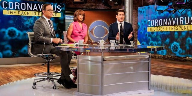 "CBS This Morning" hosts Anthony Mason, left, Gayle King and Tony Dokoupil reporting on the coronavirus, March 6, 2020. (Michele Crowe/CBS via AP)
