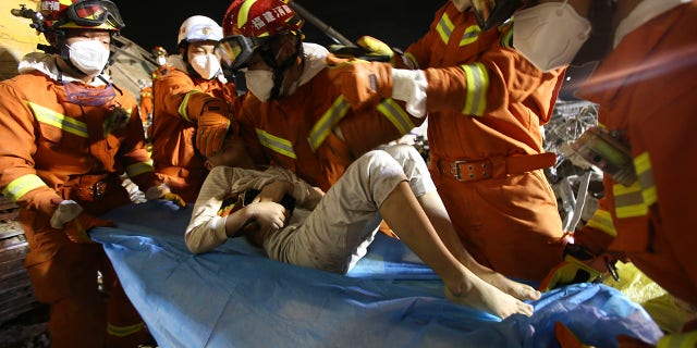 A 10 -year-old boy was pulled from the debris and rushed to a hospital.
