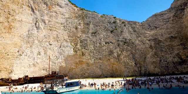 The popular beach of Navagio, or Shipwreck Beach, on the western island of Zakynthos, Greece, in a  2017 file photo.  (AP Photo/Petros Karadjias)