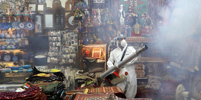 Iran releases 85,000 inmates as coronavirus sweeps through prisons: 'we're all ill' 1 A firefighter disinfects a traditional shopping center to help prevent the spread of the new coronavirus in northern Tehran, Iran, Friday, March, 6, 2020. A Health Ministry spokesman warned authorities could use unspecified “force” to halt travel between major cities.