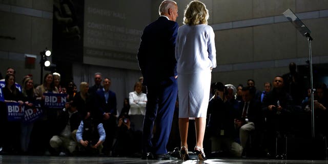 Democratic presidential candidate former Vice President Joe Biden, accompanied by his wife Jill, speaks to members of the press at the National Constitution Center in Philadelphia, Tuesday, March 10, 2020. (AP Photo/Matt Rourke)