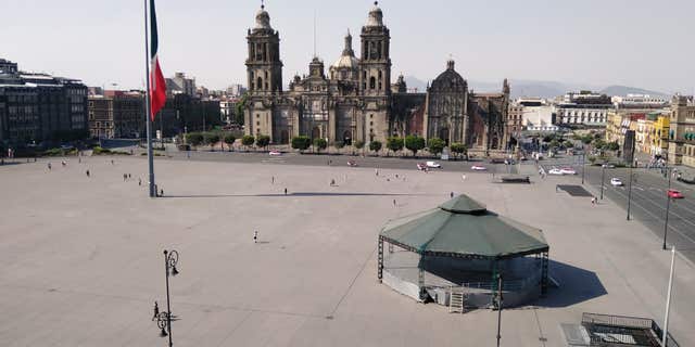 Amid the coronavirus pandemic, the Zócalo, normally packed with people, is completely empty.