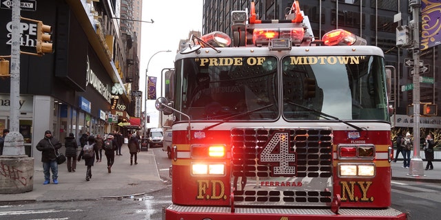 An FDNY fire engine makes a turn onto Broadway as it speeds to a call on November 28, 2018, in New York City.