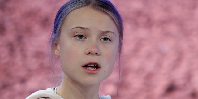 Swedish environmental activist Greta Thunberg addresses guests at the World Economic Forum in Davos, Switzerland, Tuesday, Jan. 21, 2020. The 50th annual meeting of the forum will take place in Davos from Jan. 21 until Jan. 24, 2020. (AP Photo/Michael Probst)
