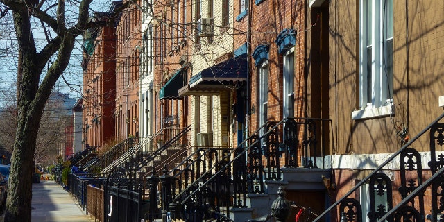 Row of houses and sidewalk in the city of Hoboken, New Jersey. (iStock)
