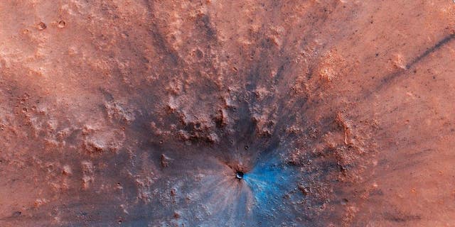 A recent impact crater on Mars. (NASA/JPL-Caltech/University of Arizona)