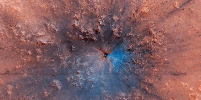 A recent impact crater on Mars. (NASA/JPL-Caltech/University of Arizona)