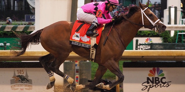 May 4, 2019; Louisville, KY, USA; Luis Saez aboard Maximum Security (7) crosses the finish line during the 145th running of the Kentucky Derby at Churchill Downs. (Jerry Lai-USA TODAY)