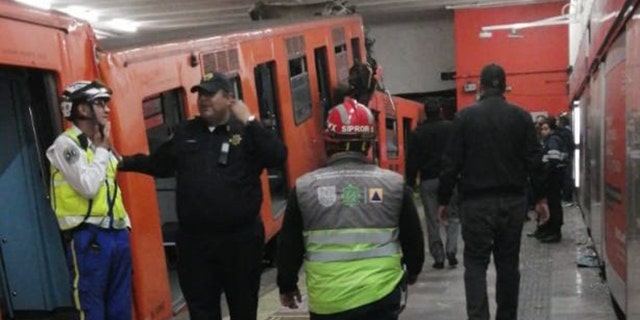 Two subway trains crashed in Mexico City, killing at least 1 person, officials said.