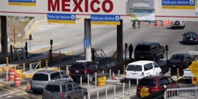 Cars crossing at the U.S.-Mexico border.