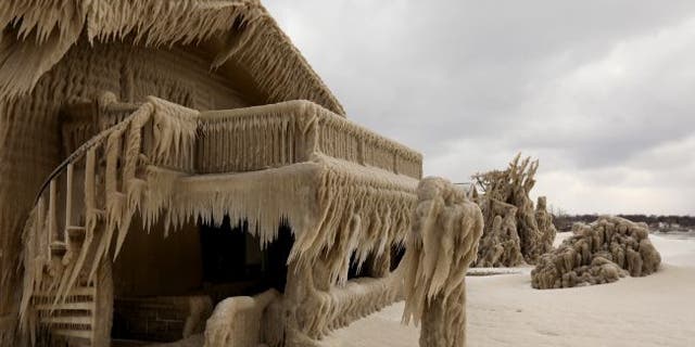 Ice formed on a house during a storm in Hamburg, New York, on Feb. 28. (Credit: Reuters/Lindsay DeDario/Newscom)