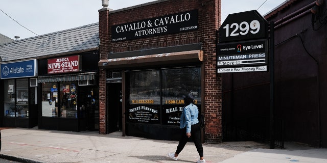 Empty streets, restaurants and cafes make up the business area in the one-mile containment zone on March 11, 2020 in New Rochelle, New York. New Rochelle, a city just north of New York City, has become the state's largest source of COVID-19 infections, prompting Governor Andrew Cuomo to announce Tuesday that officials will be implementing a one mile radius “containment area” there to try to halt the spread of Coronavirus.