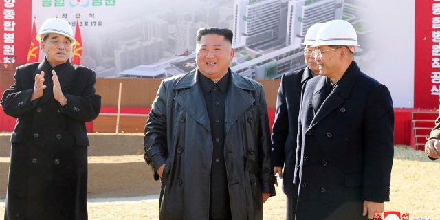 In this March 17 photo provided by the North Korean government, North Korean leader Kim Jong Un, center, attends the ground-breaking ceremony of a general hospital in Pyongyang, North Korea.