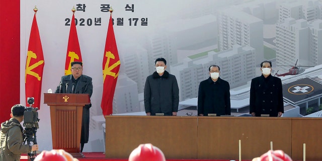 In this March 17 photo provided by the North Korean government, North Korean leader Kim Jong Un, left, delivers a speech during the ground-breaking ceremony of a general hospital in Pyongyang.