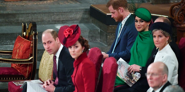 Britain's Prince William and Kate Duchess of Cambridge, front, with Prince Harry and Meghan Duchess of Sussex, behind, attend the annual Commonwealth Service at Westminster Abbey in London Monday March 9, 2020. (Phil Harris / Pool via AP)