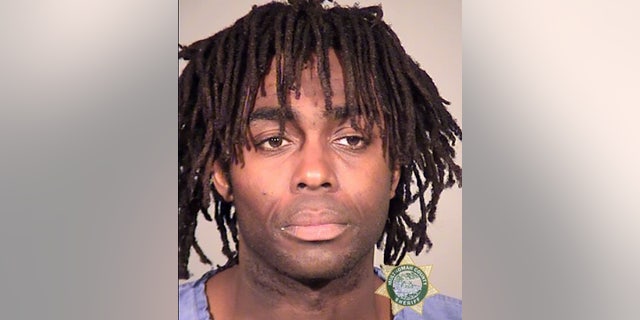 Christopher James, 40, was charged with first-degree robbery and booked into the Multnomah County Detention Center. (Portland Police Bureau)