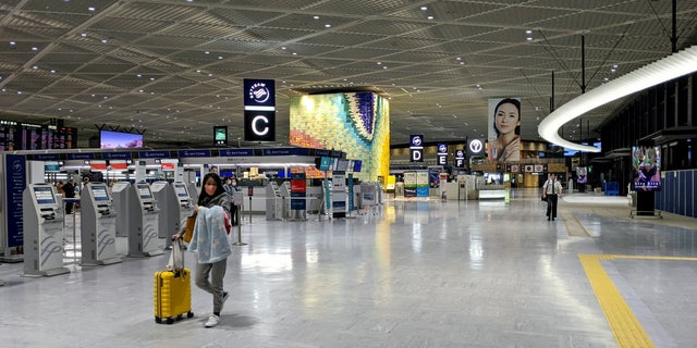 The normally-busy Terminal 1 at Tokyo Narita airport, Japan, looked deserted at 7 a.m. on March 2 amid the coronavirus outbreak.