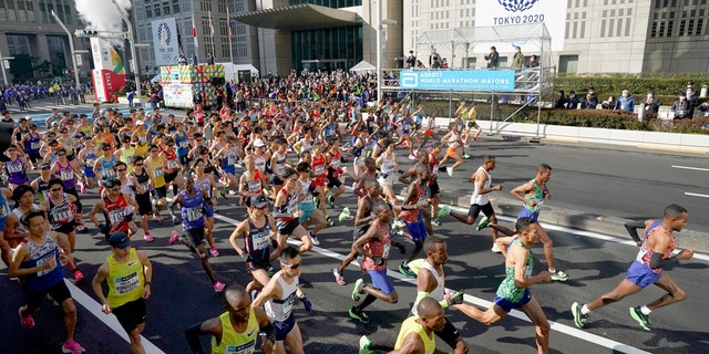 Tokyo Marathon features empty streets, signs that ask 'refrain from watching' amid coronavirus ...