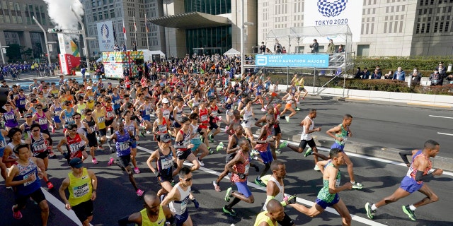 Elite runners start the Tokyo Marathon in Tokyo, Sunday, March 1, 2020. The race was scaled back as part of Japan's efforts to combat the spread of the coronavirus.