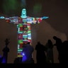 The Christ the Redeemer statue is lit up in the colors of the countries that are affected by the coronavirus outbreak in Rio de Janeiro, March 18, 2020. 