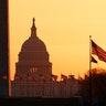 The Washington Monument and the U.S. Capitol are seen at sunrise in Washington, March 18, 2020. 