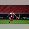 Olympiakos' Youssef El-Arabi celebrating after scoring his side's opening goal during the Europa League round of 16 first leg soccer match at the Karaiskakis Stadium in Piraeus, Greece, Mar. 12, 2020.