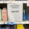 A sign on a shelf at a QFC grocery store advises shoppers that all hand sanitizer products are sold out in Kirkland, Wash., Mar. 3, 2020.