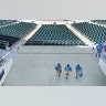 Ushers leaving empty Hammond Stadium, after a baseball game between the Minnesota Twins and the Baltimore Orioles was canceled, in Fort Myers, Fla., Mar. 12, 2020.