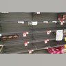 A view of empty rice and food aisles shelves at a supermarket, Brisbane, Australia, Mar. 8, 2020.