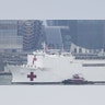 The USNS Comfort sails past the Vessel at Hudson Yards as it arrives in New York City, March 30, 2020.
