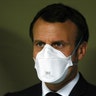 French President Emmanuel Macron wears a face mask during a visit at the military field hospital in Mulhouse, France, March 25, 2020. 