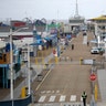 A police officer walks along the exit road at a near-empty Santa Monica Pier following a temporary closure as part of measures to combat the spread of the coronavirus in Los Angeles, March 16, 2020.