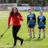 Kate the Duchess of Cambridge reacts as she tries playing hurling next to Britain's Prince William at Salthill Knocknacarra GAA Club in Galway, Ireland, March 5, 2020.