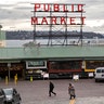 Seattle, Washington: The Pike Place Market standing virtually empty of patrons. The historic farmer's market is Seattle's most popular tourist attraction, and business has been especially hard hit by coronavirus fears. 