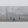 San Francisco, California: A street performer sitting alone at Fisherman's Wharf Thursday, March 12, 2020.