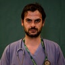 Alessandro D'Aveni, 33, an oncologist working in the COVID sub-intensive care unit at the Humanitas Gavazzeni Hospital, poses for a portrait at the end of his shift in Bergamo, Italy, March 27, 2020.