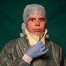 Claudia Accardo, ICU transport service at Rome's COVID 3 Spoke Casalpalocco Clinic, poses for a portrait during a break in her daily shift in Rome, Italy, March 27, 2020.