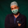Mirko Perruzza, 43, a nurse at Rome's COVID 3 Spoke Casalpalocco Clinic, poses for a portrait during a break in his daily shift in Rome, Italy, March 27, 2020.
