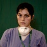 Lucia Perolari, 24, a nurse at the Humanitas Gavazzeni Hospital, poses for a portrait at the end of her shift in Bergamo, Italy, March 27, 2020.