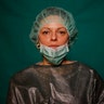 Laura Orsini, 39, an administrative worker at Rome's COVID 3 Spoke Casalpalocco Clinic, poses for a portrait during a break in her daily shift in Rome, Italy, March 27, 2020.