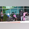 Patients wait to be seen at a medical testing site, set up amid the virus outbreak at Memorial Hospital West in Pembroke Pines, Fla., March 17, 2020.