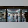 National Guard personnel who carry out bio screening on arriving passengers walk around the Luis Mu?oz Marin Airport in an effort to detect and isolate the new coronavirus, in Carolina, Puerto Rico, March 17, 2020.