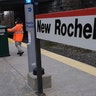 Employees of Metro-North Railroad disinfecting parts of the New Rochelle Metro-North station.