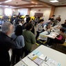 Voters wait in line to cast their ballot on the Super Tuesday, at a voting center in Alhambra, Calif. 