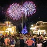 Guests gather on Main Street USA, in the Magic Kingdom at Walt Disney World, to watch fireworks before the park closed, Sunday night, March 15, 2020, in Lake Buena Vista, Fla. Walt Disney World announced that all their parks will be closed for the rest of March as a result of the coronavirus pandemic.