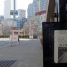 The street next to a Seattle Times newspaper box in front of the building that houses the Times' newsroom is empty, Sunday, March 15, 2020 in Seattle, as the headline "Silence in Seattle" is displayed. Washington Gov. Jay Inslee said Sunday night that he would order all bars, restaurants, entertainment and recreation facilities in the state to temporarily close to fight the spread of coronavirus, as Washington state has by far the most deaths in the U.S. from the disease.